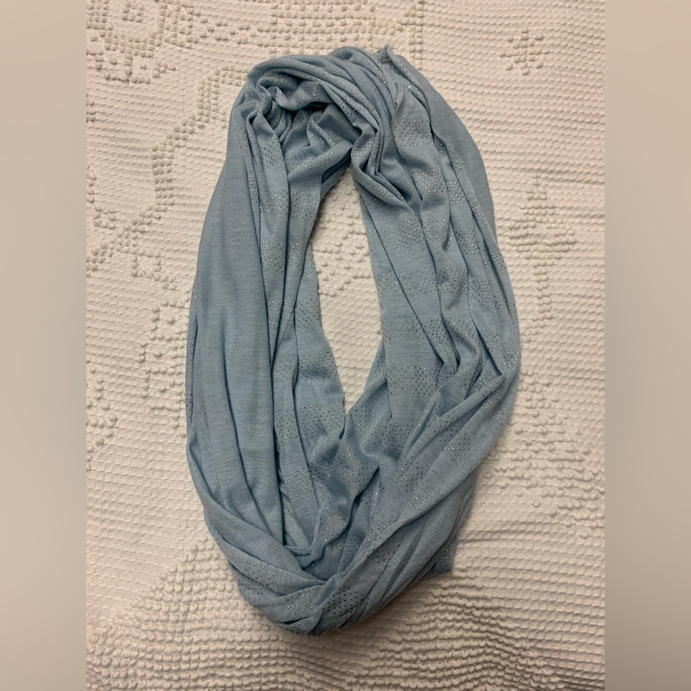 Pennington’s light blue circle scarf